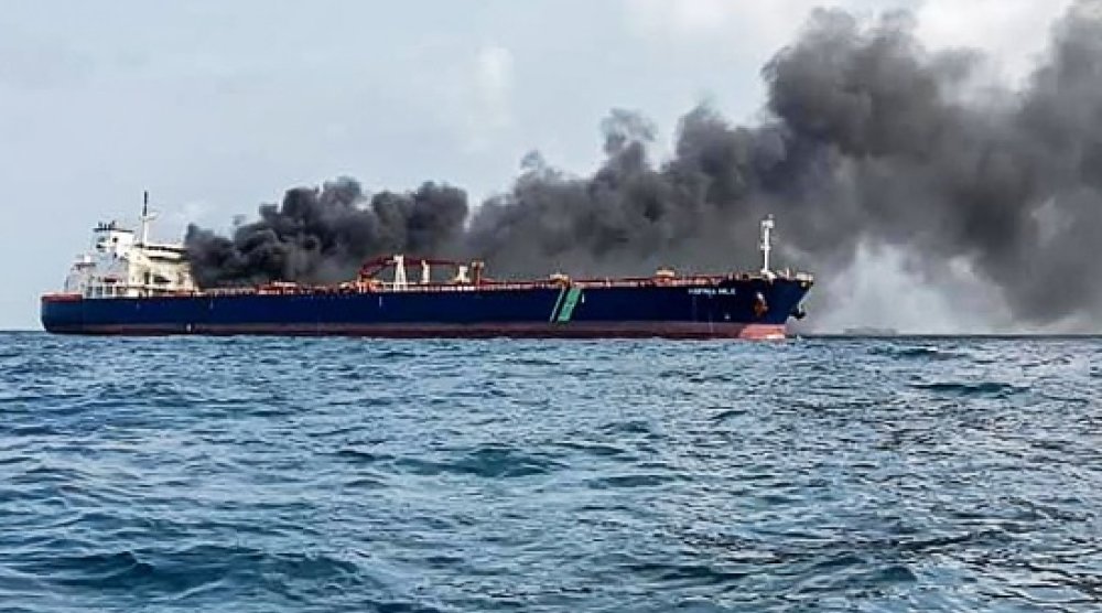 Oil tankers on fire off Singapore, crew members rescued